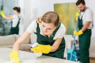 Cleaning services Houston team working on cleaning an office