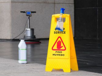 Cleaning services Houston wet floor caution sign