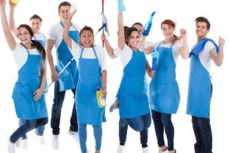 Janitorial services team jumping for joy